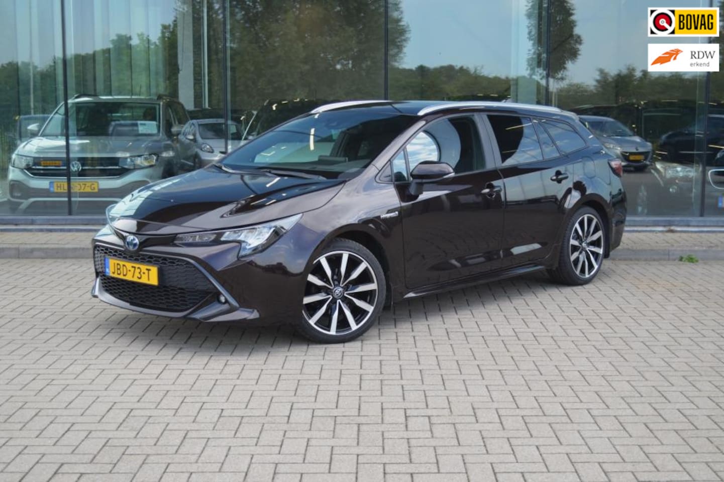 Toyota Corolla Touring Sports - 1.8 Hybrid Business | Trekhaak | Stoelverwarming | Elek. achterklep - AutoWereld.nl