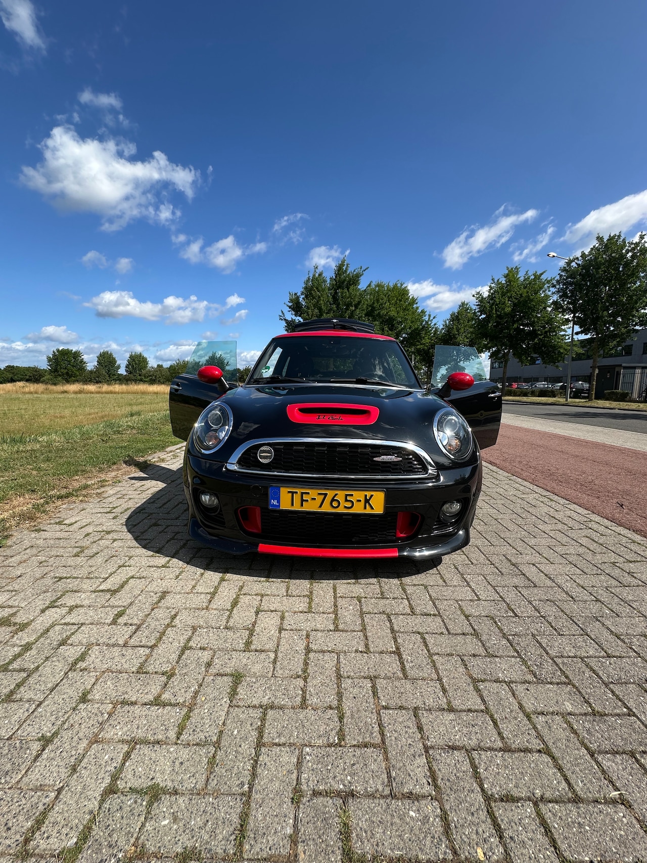 MINI Mini - 1.6 John Cooper Works 2011 MINI John Cooper Works 1.6 (standaard JCW-R56 uitvoering), compleet met sportieve ver - AutoWereld.nl