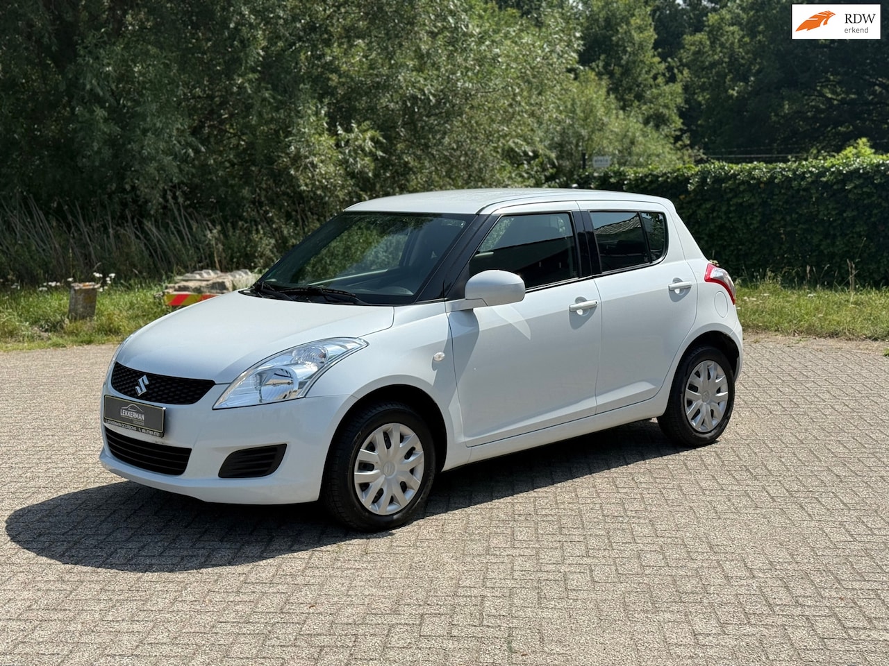 Suzuki Swift - 1.2 Exclusive EASSS AIRCO I 13.277KM I AIRCO I STOELVERW. - AutoWereld.nl