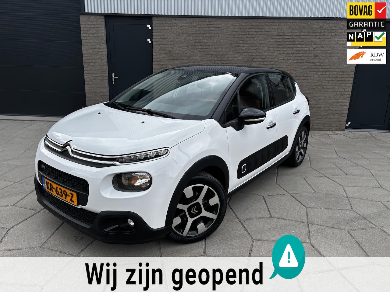 Citroën C3 - 1.2 PureTech S&S Shine| Frisse C3 vlotte Oranje accenten en bruikbare accecoires - AutoWereld.nl