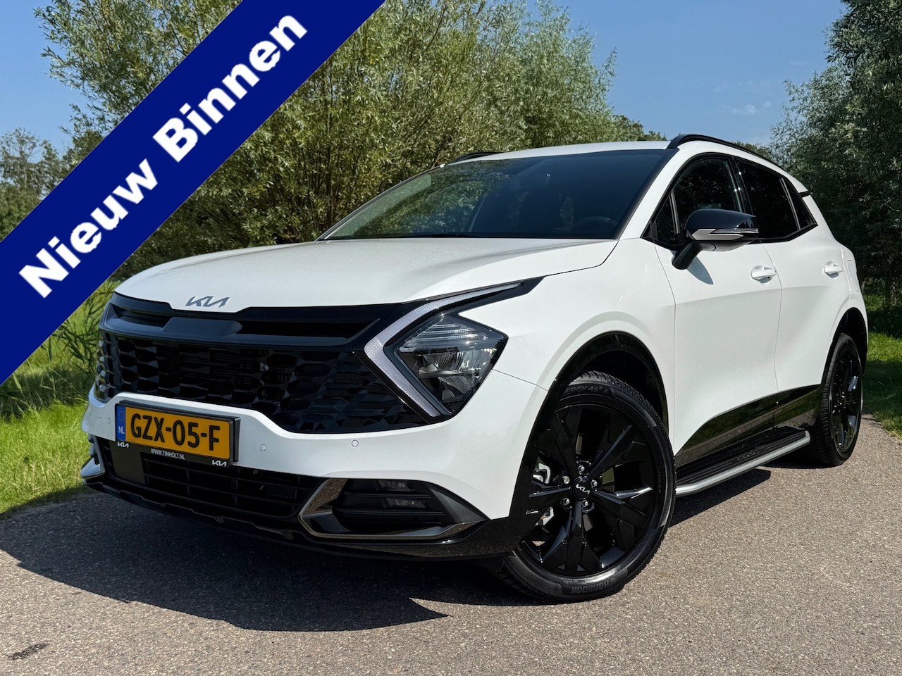 Kia Sportage - 1.6 T-GDi Plug-in Hybrid AWD Dark Edition / Automaat / Stoel + stuurverwarming / Navigatie - AutoWereld.nl