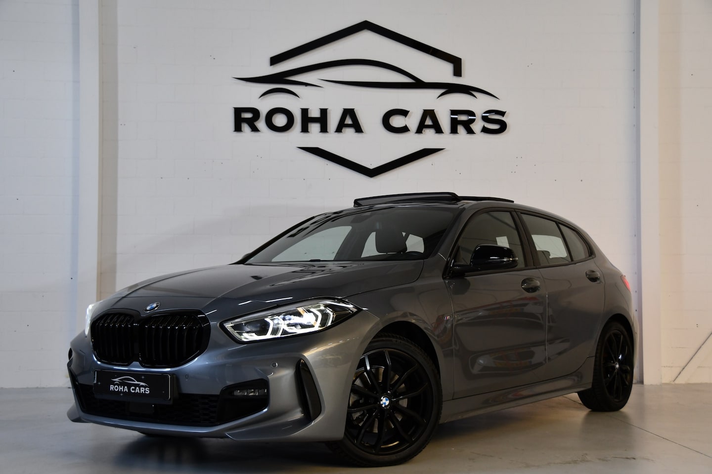 BMW 1-serie - 118 i Executive M Sport Pakket Pano Sfeerverlichting - AutoWereld.nl