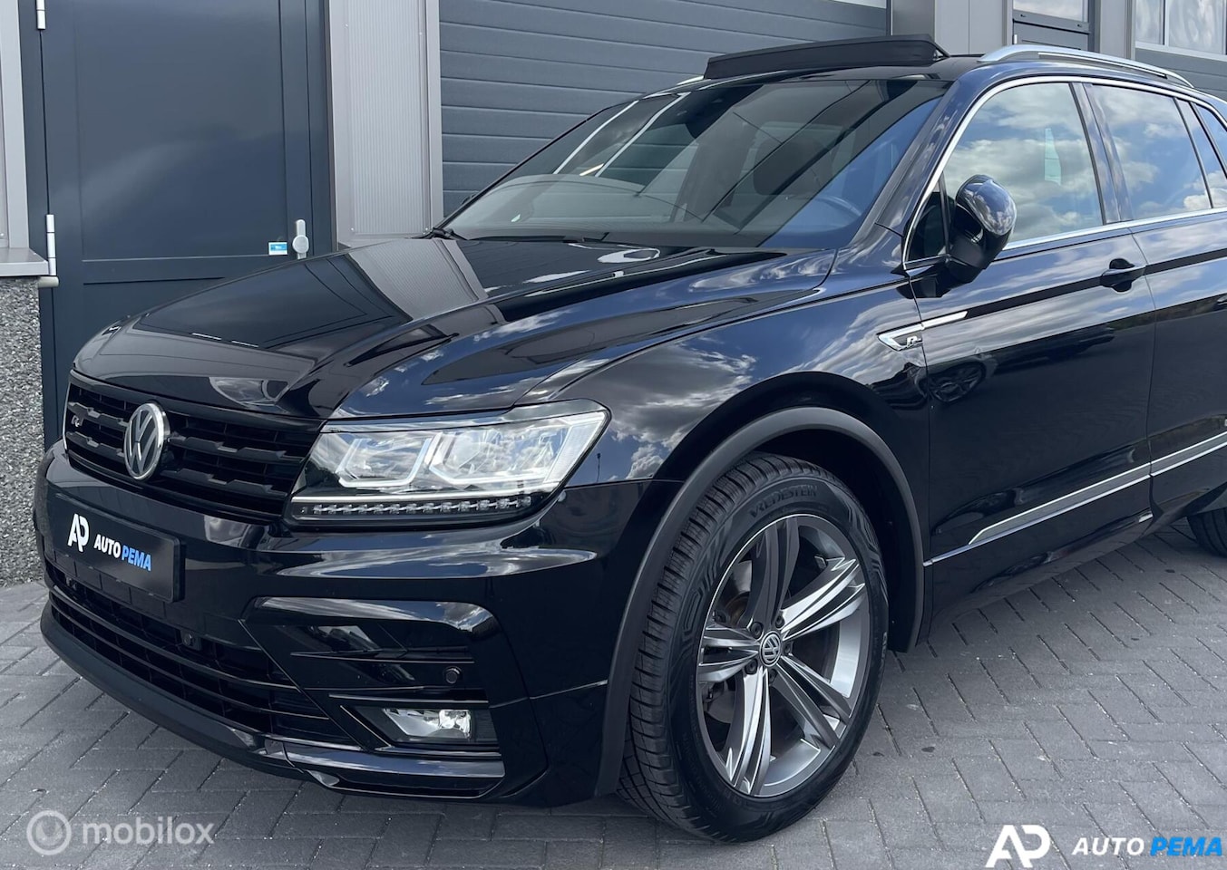 Volkswagen Tiguan - 1.4 TSI DSG R-Line 150PK/PANO/LED - AutoWereld.nl