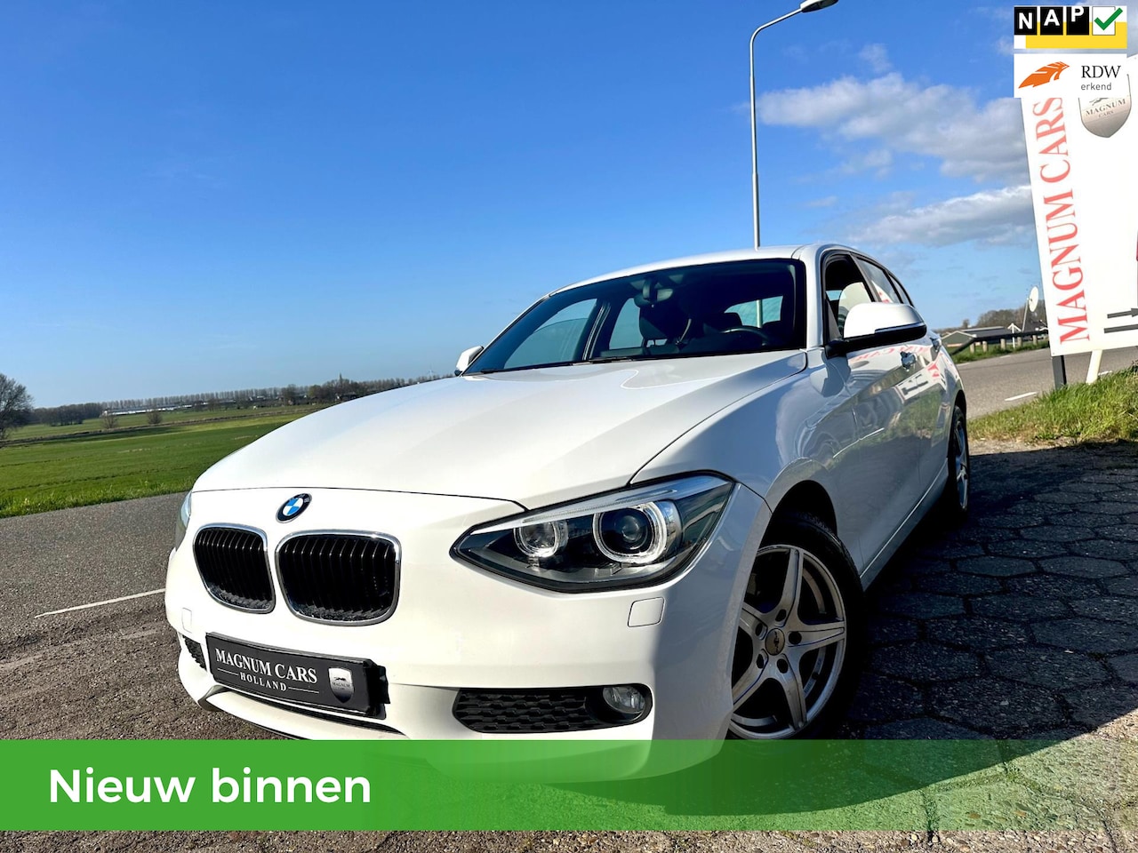 BMW 1-serie - 116i NAP 5D Airco Xenon Nieuwe APK Navi Scherm Velgen Cruise Control - AutoWereld.nl