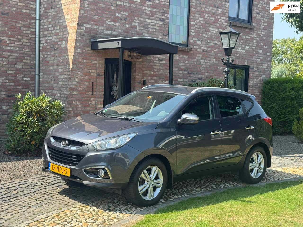Hyundai ix35 - 2.0i Style Automaat Navi Trekhaak - AutoWereld.nl