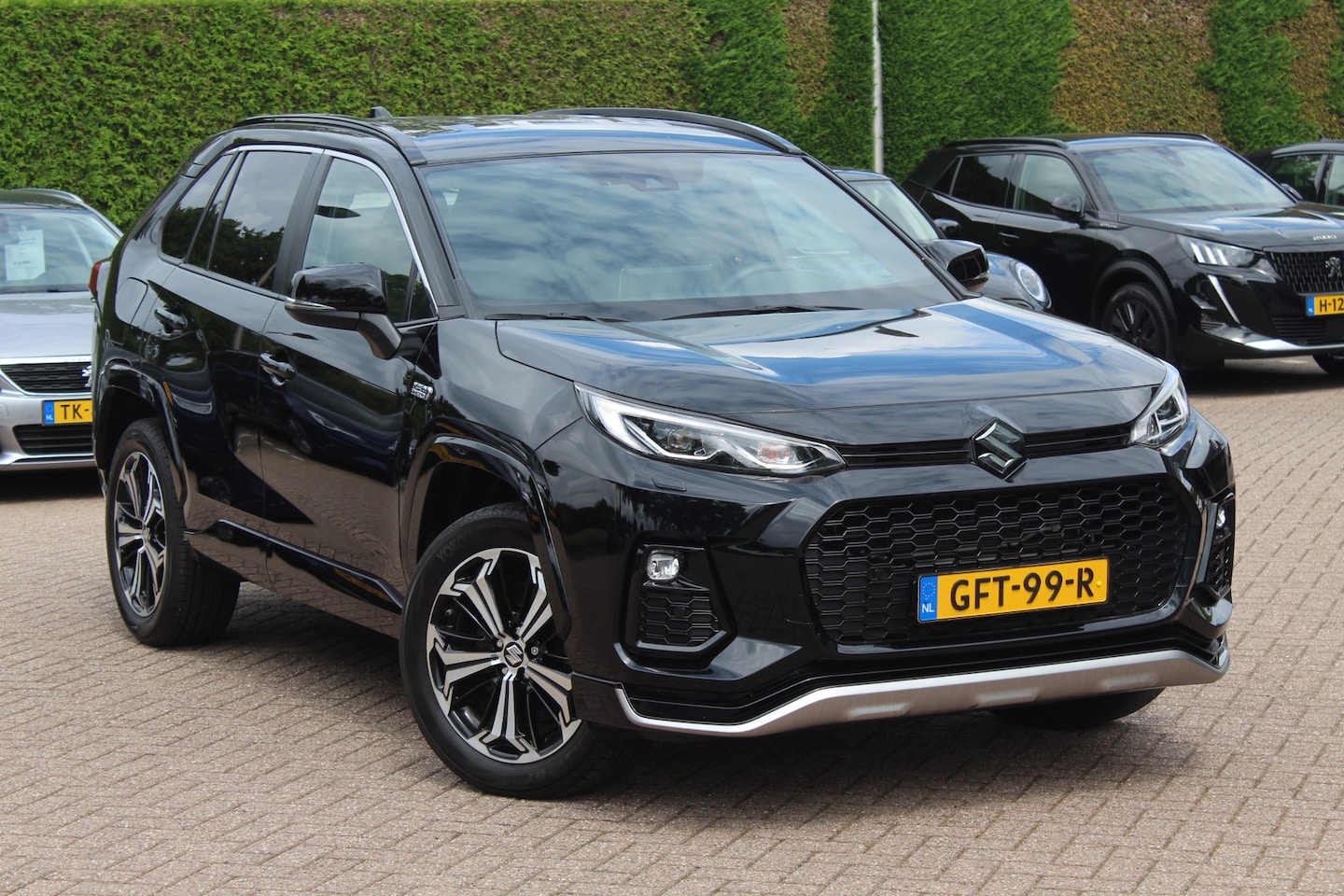 Suzuki Across - 2.5 Plug-in Hybrid Style / Trekhaak / Camera / Half leder / 19'' / Keyless / Stuurverwarmi - AutoWereld.nl