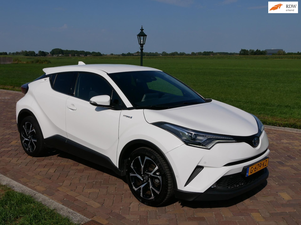 Toyota C-HR - 1.8 Hybrid Style Ultimate ** 13499 NETTO ** JBL LED NAVI - AutoWereld.nl