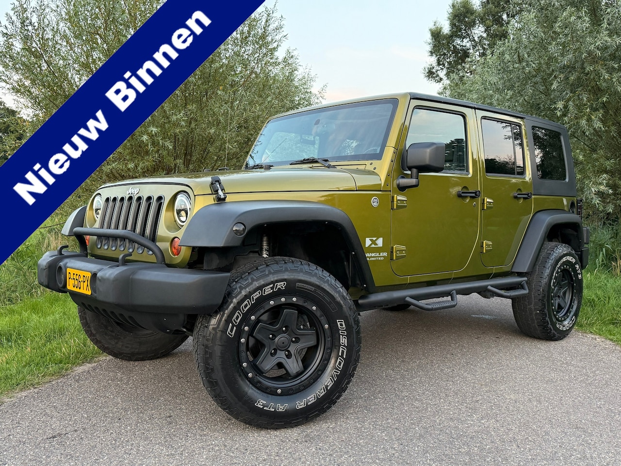 Jeep Wrangler Unlimited - 3.8 Automaat | Youngtimer | Camera | Airco | Sidebars | LED | 17" Velgen | - AutoWereld.nl