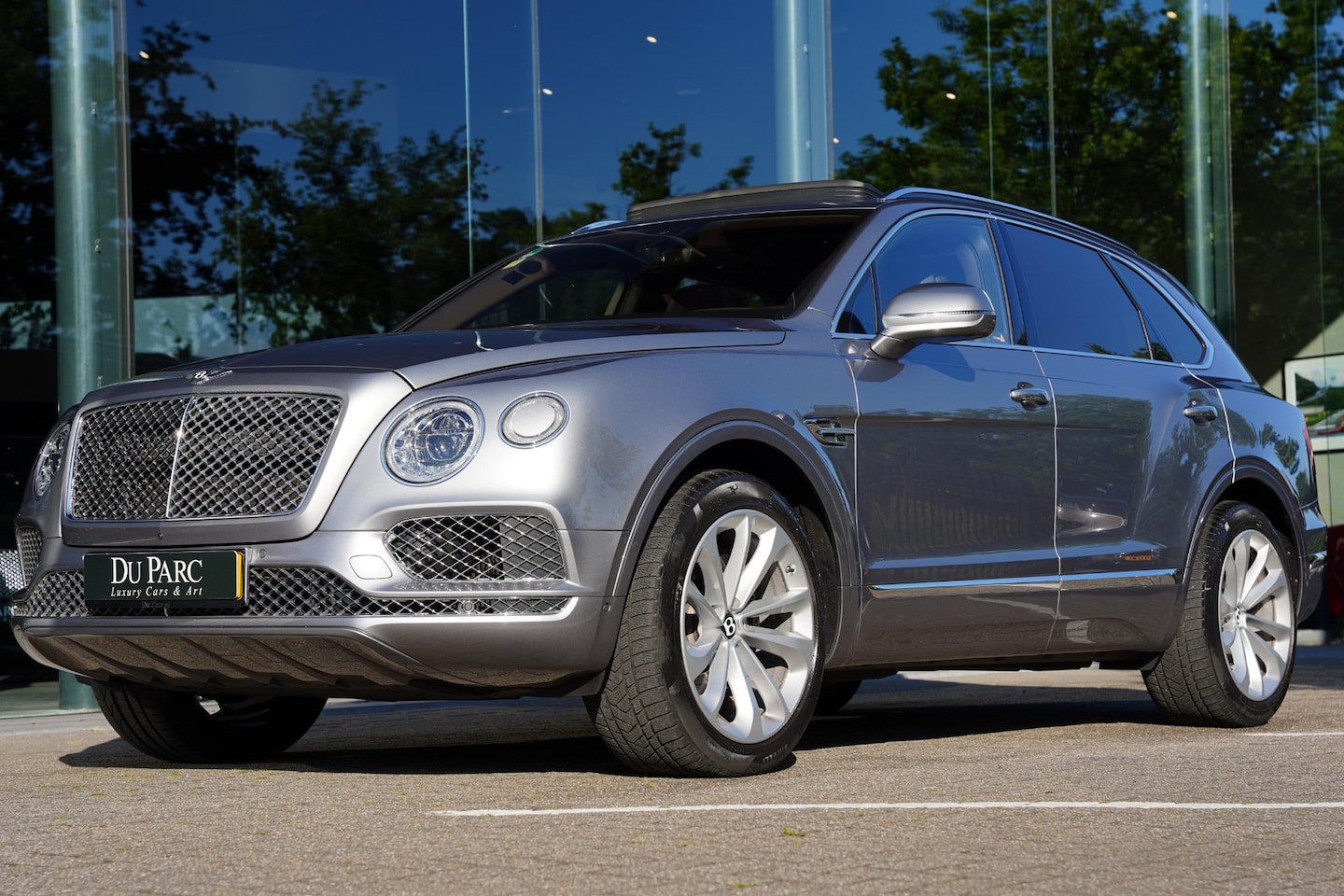 Bentley Bentayga - 6.0 W12 Mulliner Volleder Natuurbruin - AutoWereld.nl