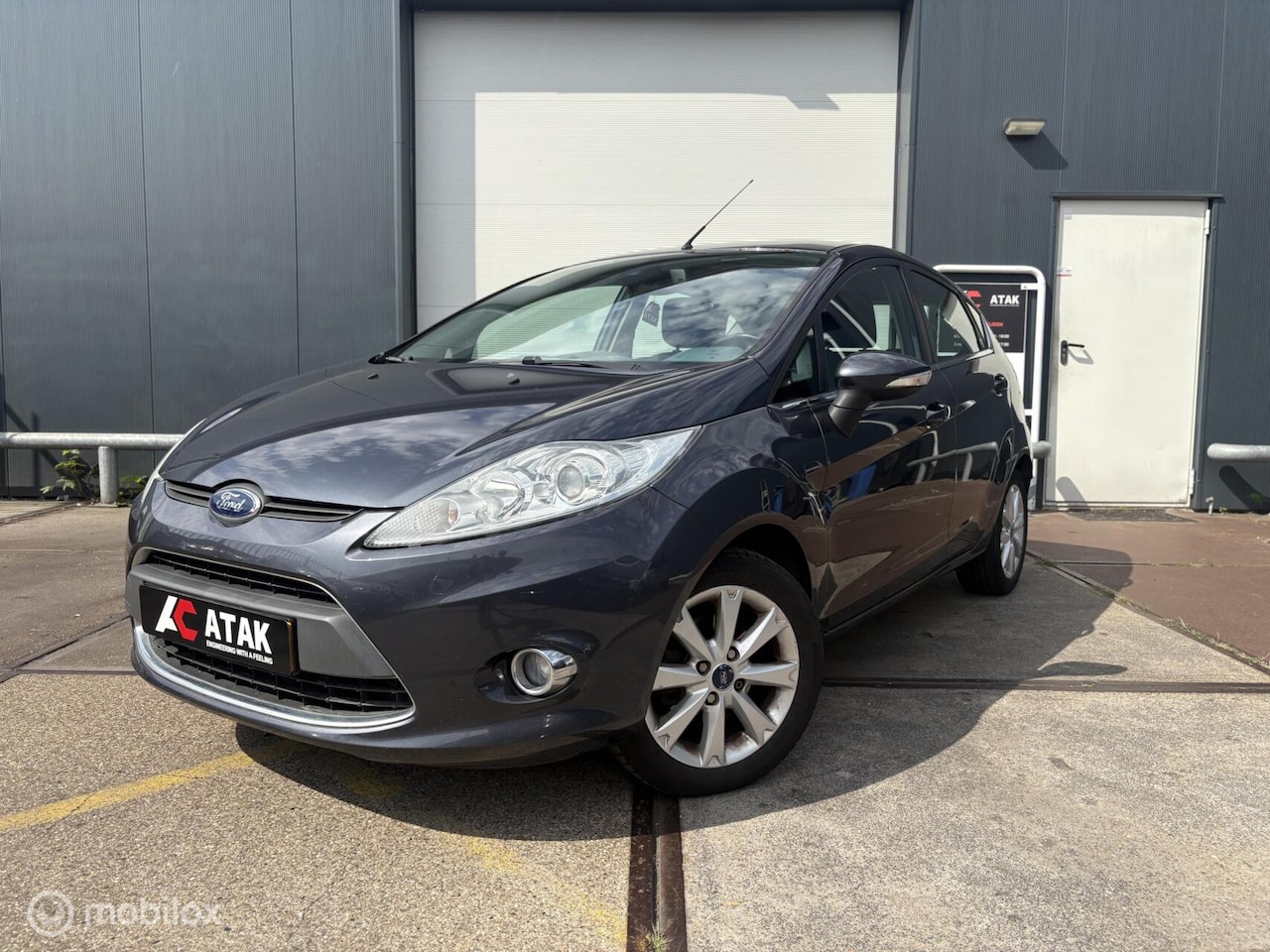 Ford Fiesta - 1.25 Ghia 1.25 Ghia - AutoWereld.nl