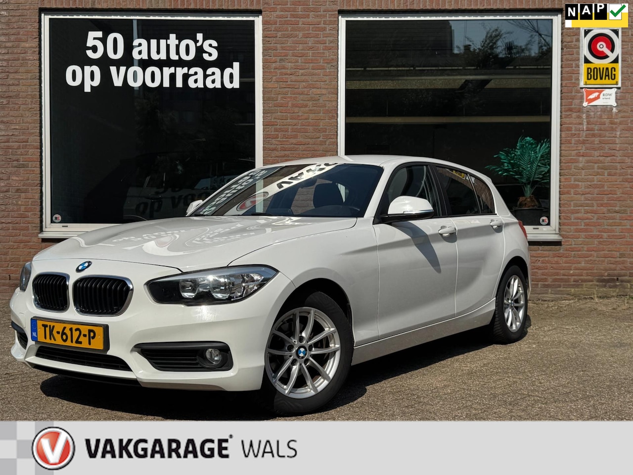 BMW 1-serie - 118i CORPORATE | NAVI | AUTOMAAT | CLIMA | PDC | VELGEN - AutoWereld.nl