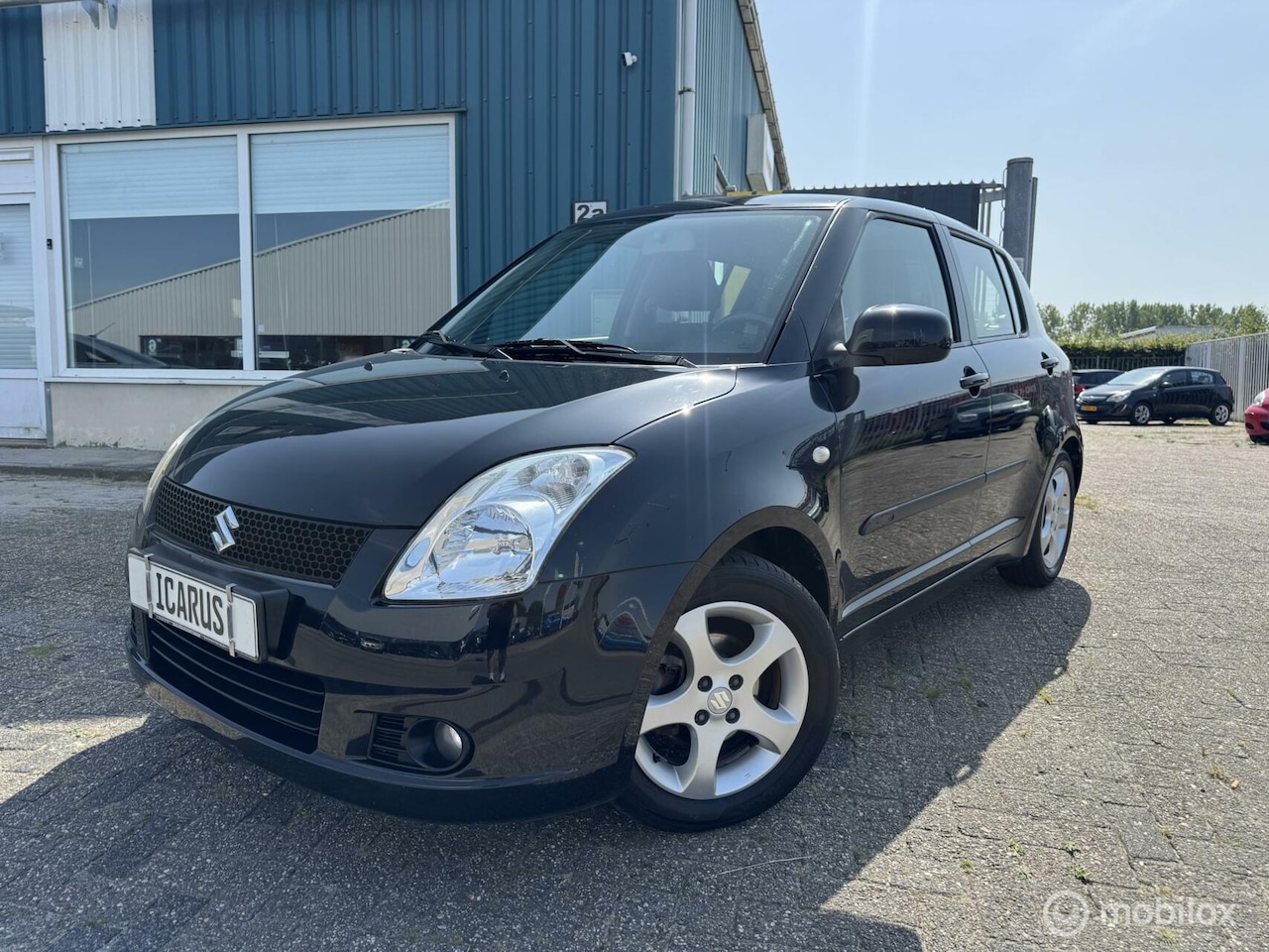Suzuki Swift - 1.3 GLS apk|airco|nap|boekjes|5 deurs - AutoWereld.nl