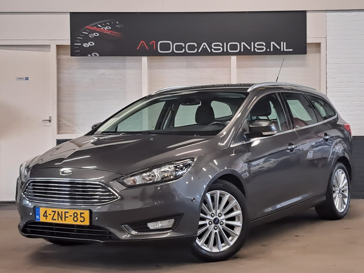 Ford Focus Wagon - 1.0 First Edition + NAVI - AutoWereld.nl
