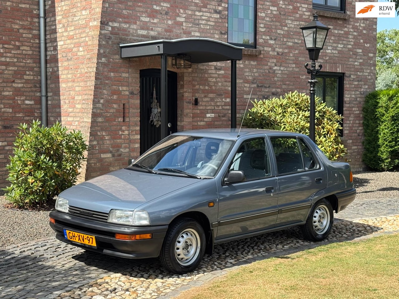 Daihatsu Charade - 1.3i SG uniek 1e eigenaar! 74000km. - AutoWereld.nl