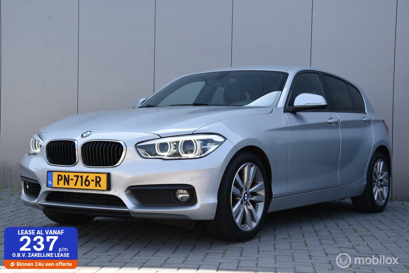 BMW 1-serie - 118i Corporate Lease Executive | Leer | Camera | Stoelverwarming | Clima | - AutoWereld.nl