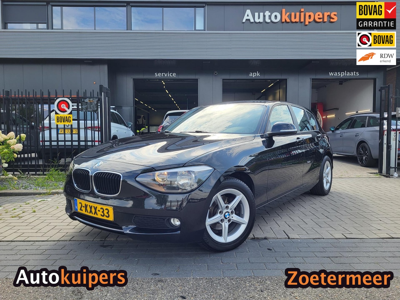 BMW 1-serie - 114i EDE | Met o.a. navigatie, cruise control, armsteun, airco en in goede staat! - AutoWereld.nl
