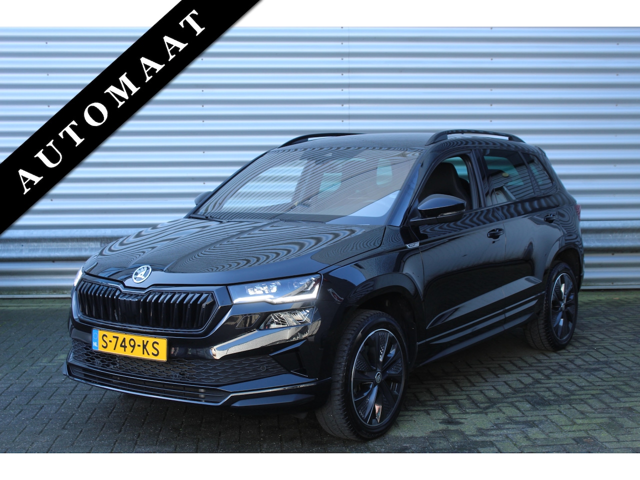 Skoda Karoq - 1.5 TSI ACT 150pk Sportline Business DSG7 NL-Auto NAP Clima Cruise Navi Camera Trekhaak 15 - AutoWereld.nl