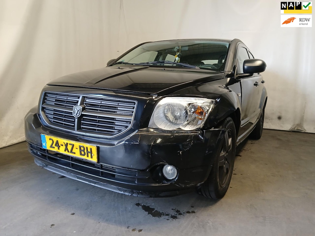 Dodge Caliber - 2.0 SXT - Airco - Navi - Schade - AutoWereld.nl