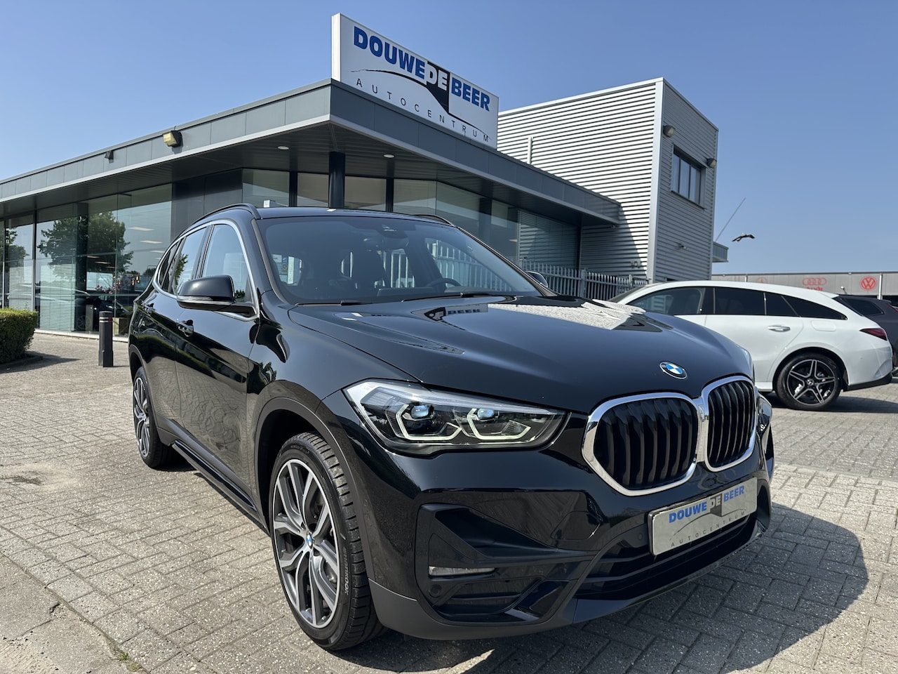 BMW X1 - sDrive18i Sport Line Adapt. Cruise | HUD | Camera | Elekt. Klep | Stoelverw, - AutoWereld.nl