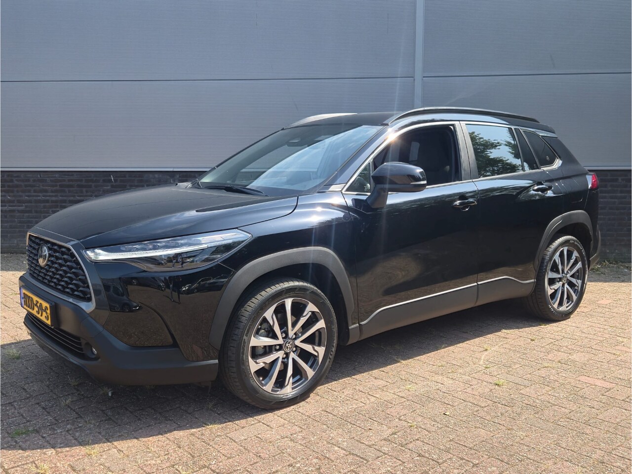 Toyota Corolla Cross - Hybrid 140 Style Limited, PDC, BSM, Stoel & Stuur verwarming - AutoWereld.nl