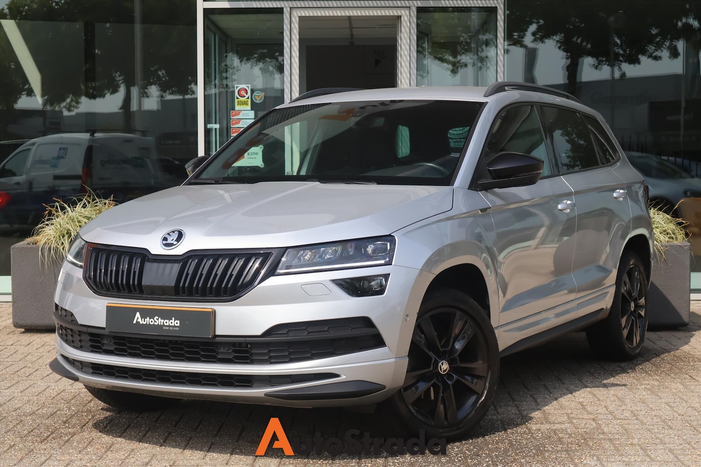 Skoda Karoq - 1.5 SportLine TSI ACT 150pk | Camera | Virtual | Climate | Virtual | LED | Trekhaak | Carp - AutoWereld.nl