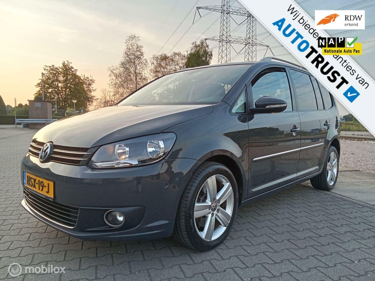 Volkswagen Touran - 1.4 TSI Highline 7p/clima/navi/trekhaak - AutoWereld.nl