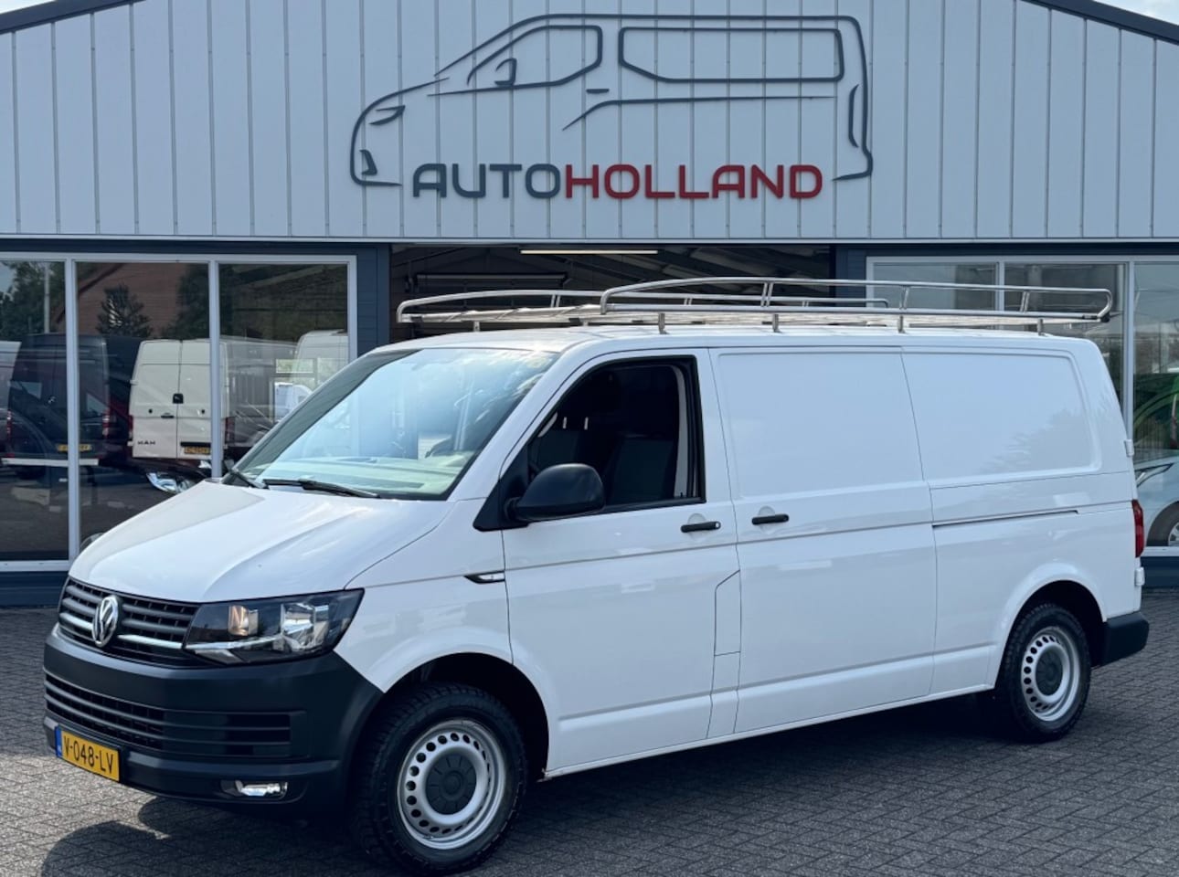 Volkswagen Transporter - 2.0 TDI 75KW 102PK L2H1 EURO 6 AIRCO/ TREKHAAK/ RVS IMPERIAAL/ 100% DEALERONDERHOUDEN - AutoWereld.nl