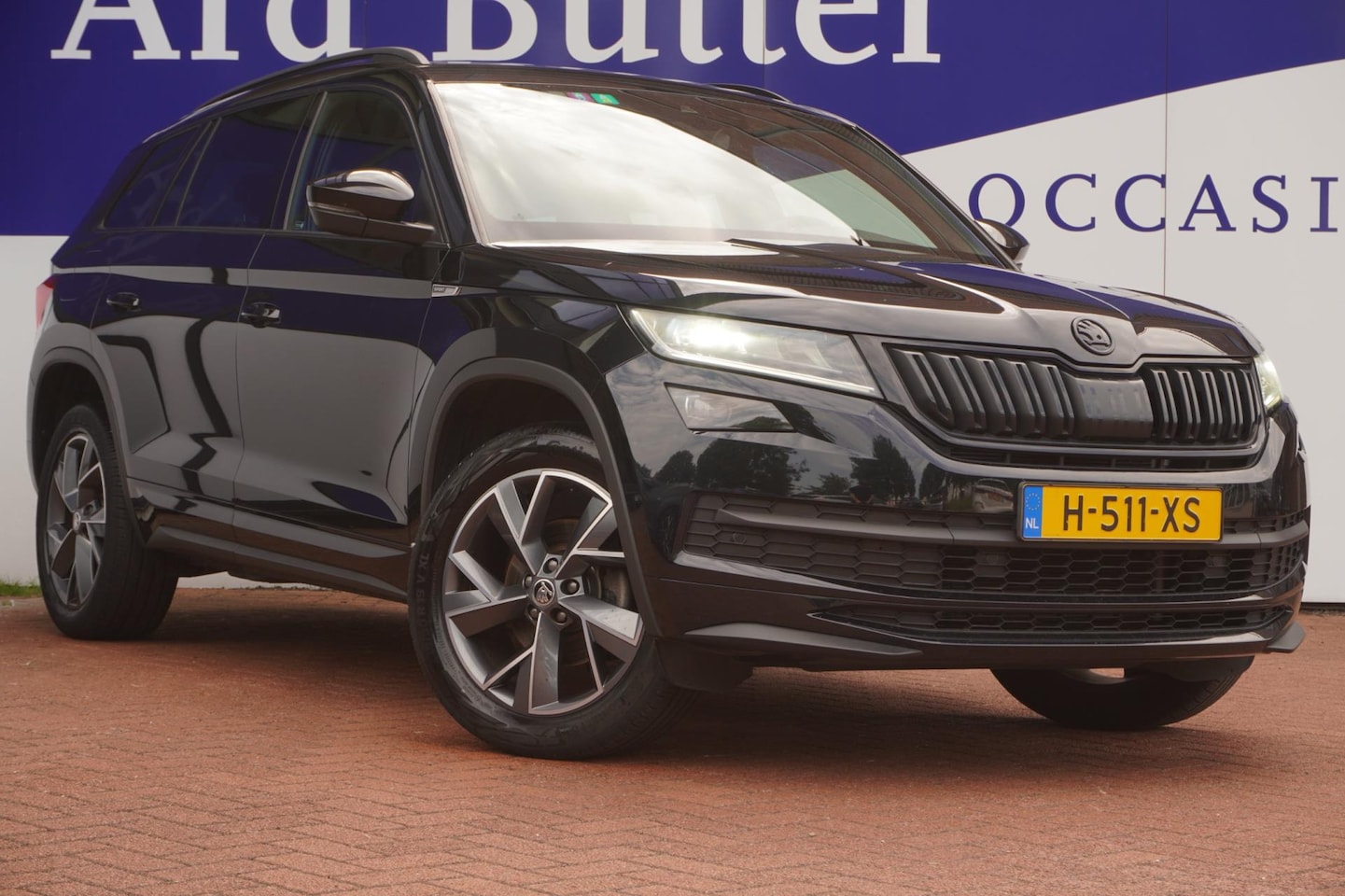 Skoda Kodiaq - 1.5 TSI 150PK Sportline Business+camera+stoel-verw+Comf-Functie-navi-Pakket+adaptief-cruis - AutoWereld.nl