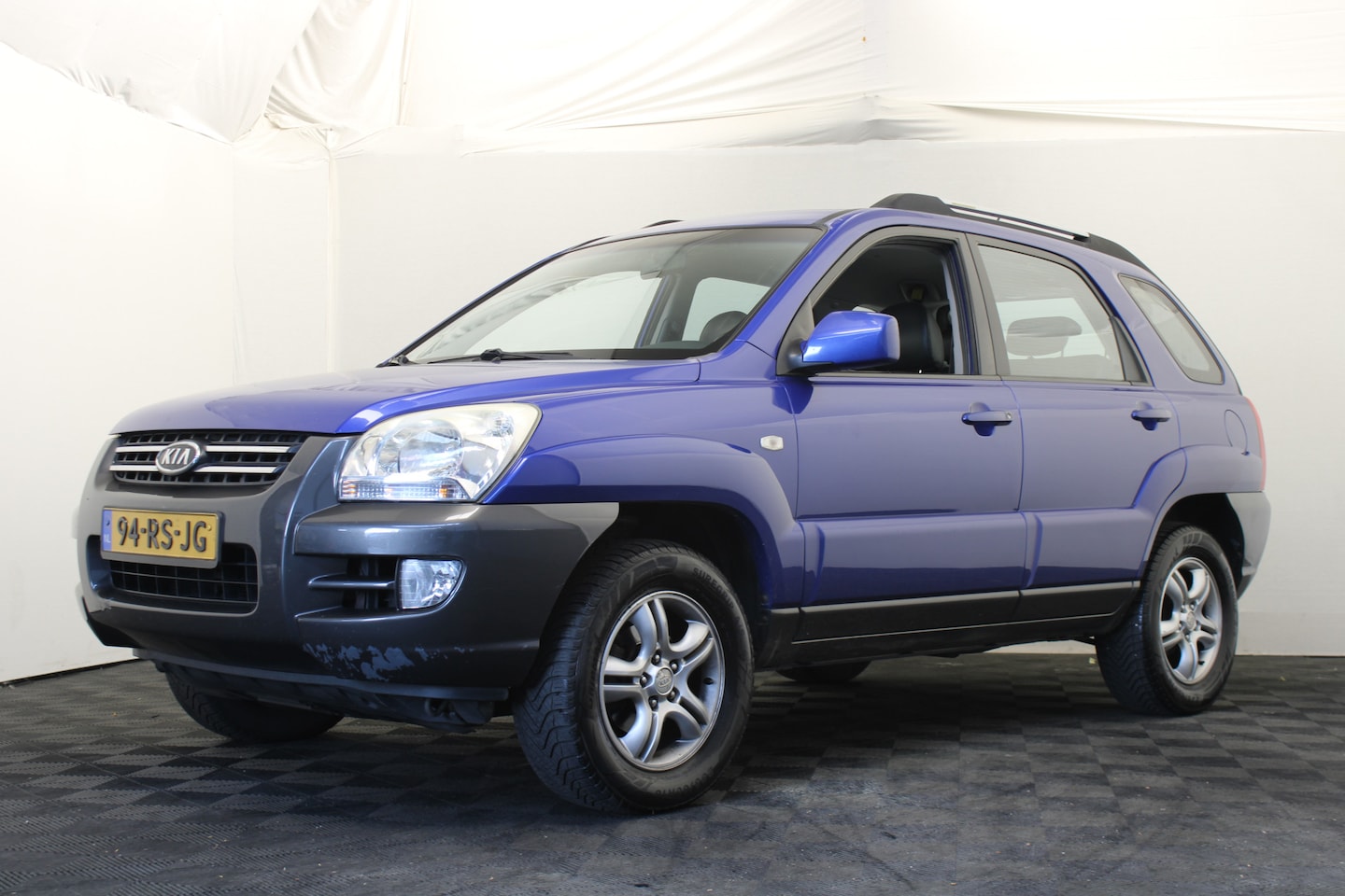 Kia Sportage - 2.0 CVVT Executive 2.0 CVVT Executive - AutoWereld.nl