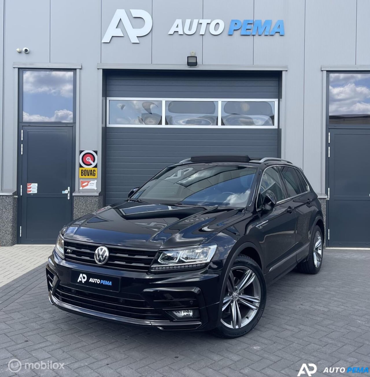 Volkswagen Tiguan - 1.4 TSI DSG R-Line 150PK/PANO/LED - AutoWereld.nl
