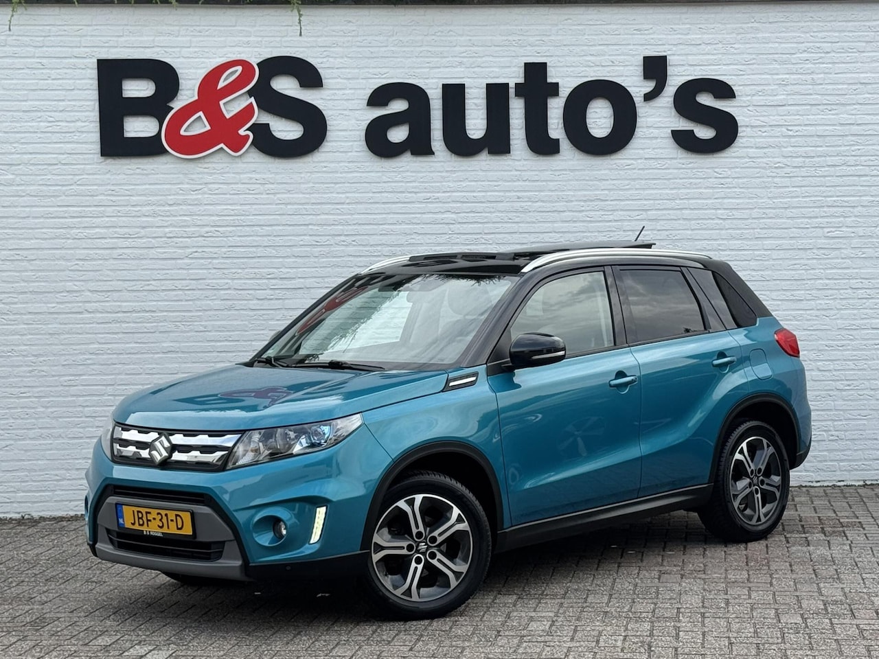 Suzuki Vitara - 1.6 High Executive Allgrip Panorama Adaptive cruise Camera Led Pdc v+a Keyless - AutoWereld.nl