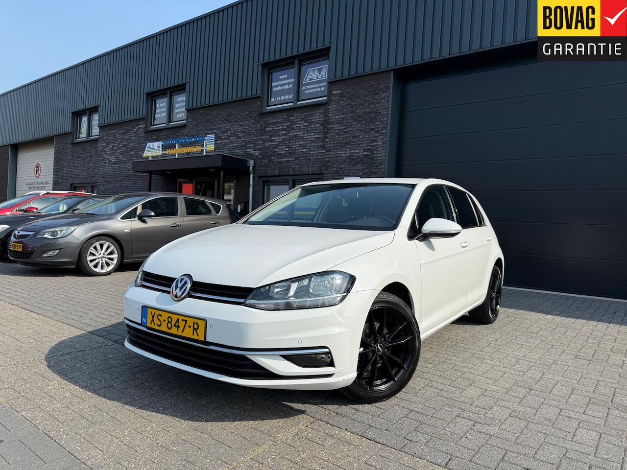 Volkswagen Golf - 1.0 TSI Comfortline Business | 2E EIGENAAR | 12MND GARANTIE | NAVI | CARPLAY | CRUISE | DA - AutoWereld.nl
