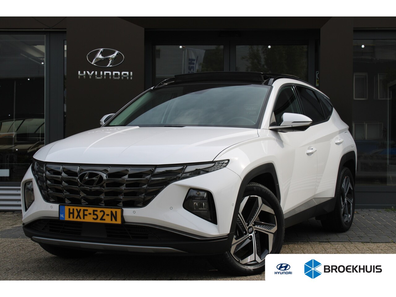 Hyundai Tucson - 1.6 T-GDI PHEV Premium Sky 4WD | Elektrisch glazen panorama-dak | Elektrisch verstelb. bes - AutoWereld.nl