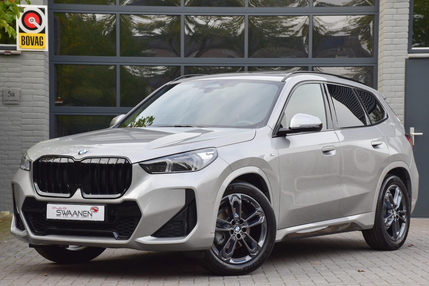 BMW X1 - sDrive18i M Sport | Panoramadak | ACC | Leer - AutoWereld.nl