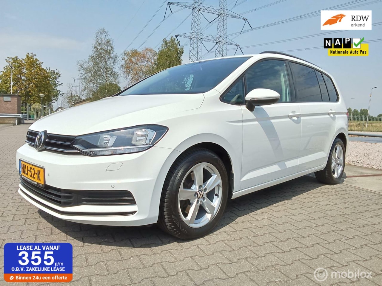 Volkswagen Touran - 1.4 TSI Comfortline Edition 7p/clima/cruise/navi - AutoWereld.nl