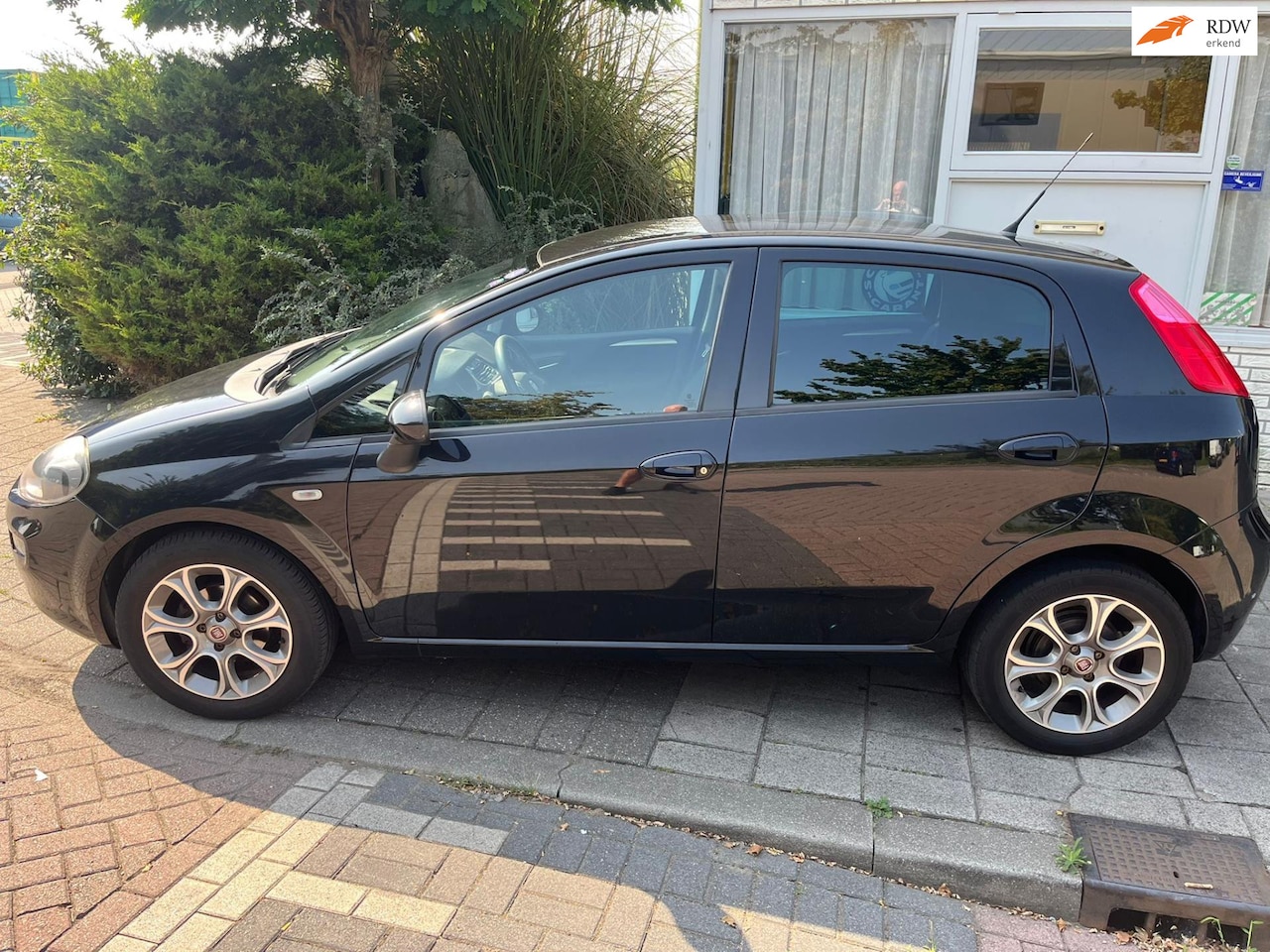 Fiat Punto Evo - 0.9 TwinAir Lounge 0.9 TwinAir Lounge - AutoWereld.nl