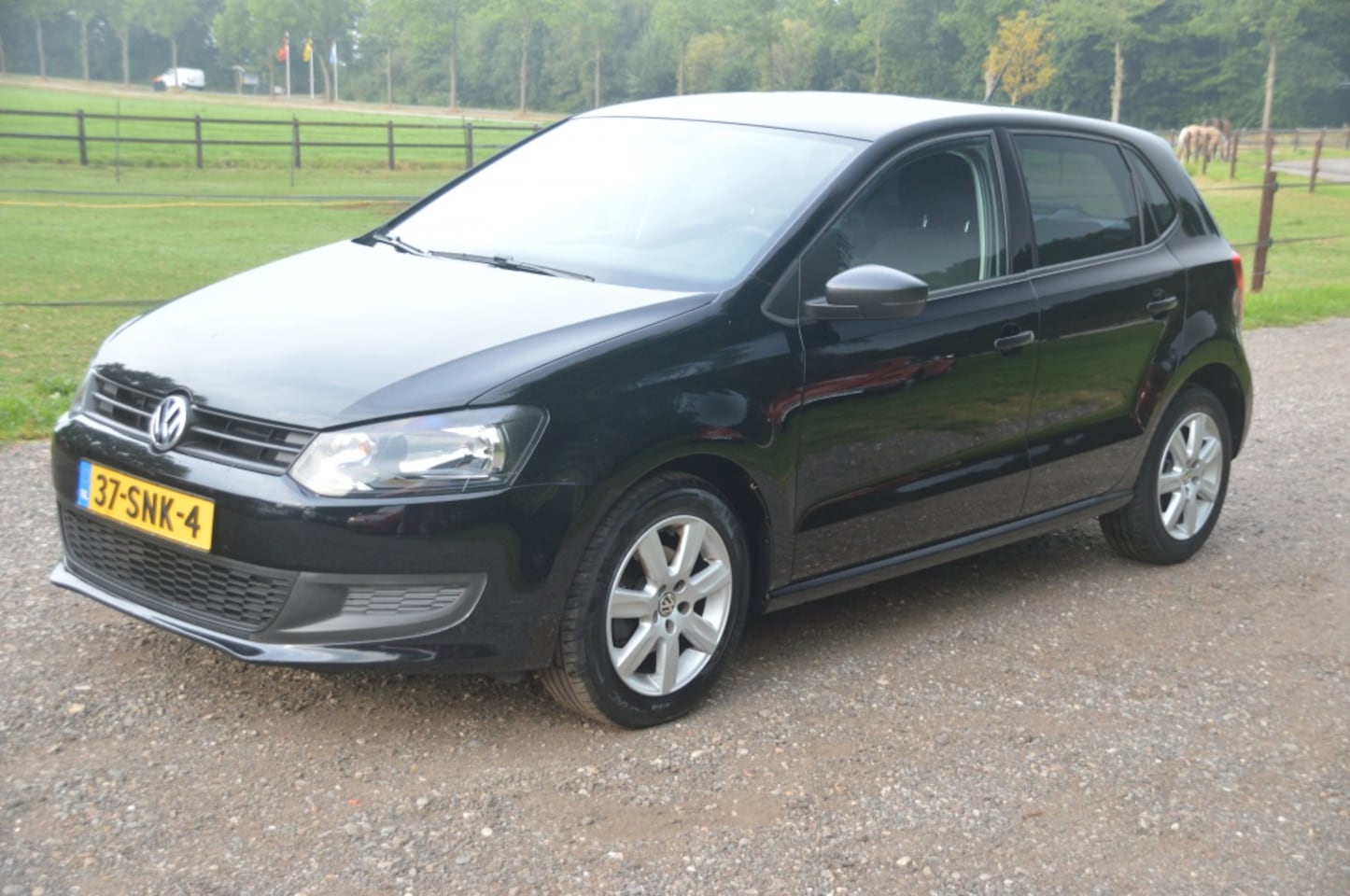 Volkswagen Polo - 1.2 Easyline Zwart 5 deurs Airco - AutoWereld.nl