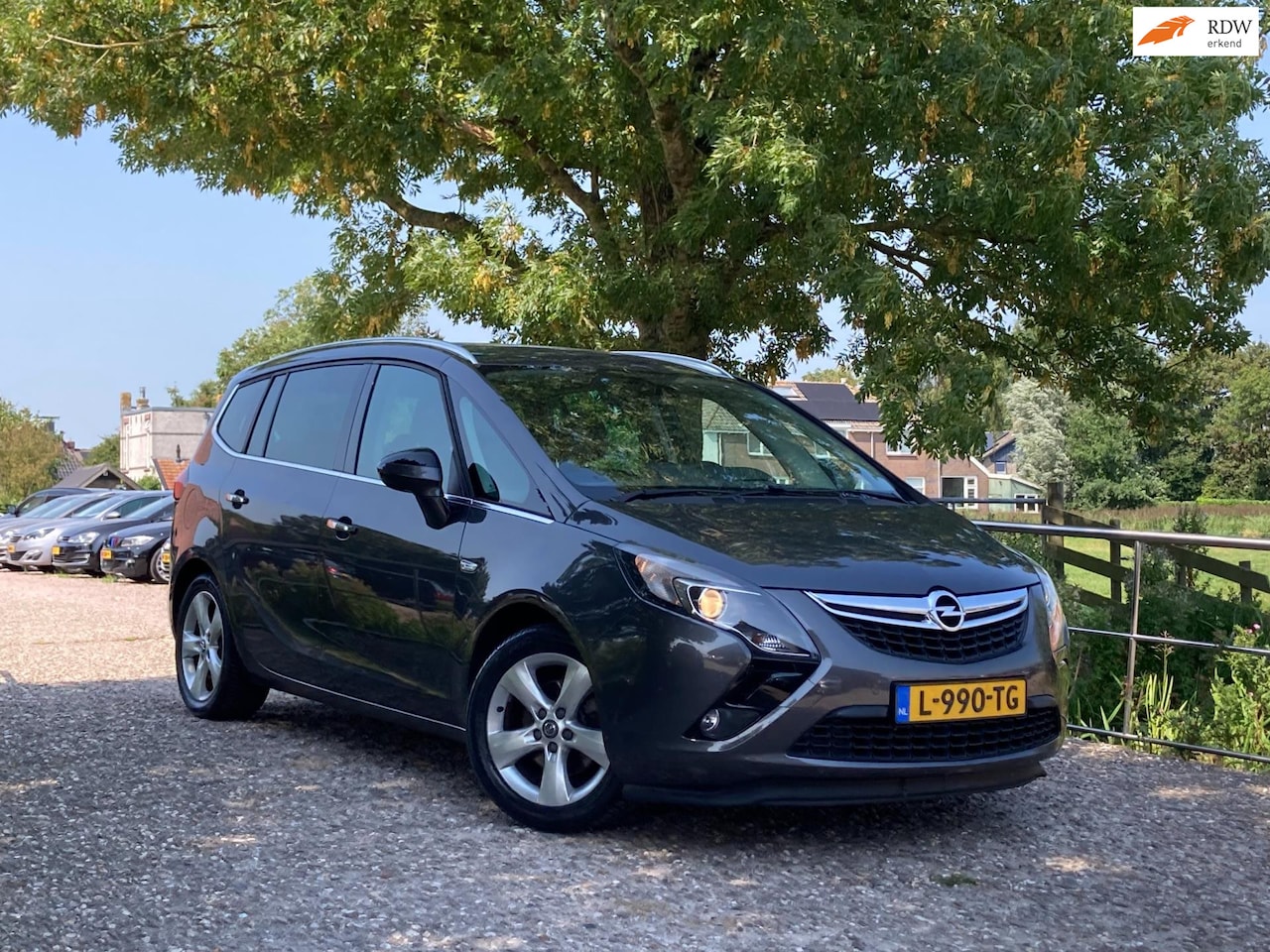 Opel Zafira Tourer - 1.4 Cosmo 7p. | Leder + Clima + Cruise nu € 7.450,-!!! - AutoWereld.nl
