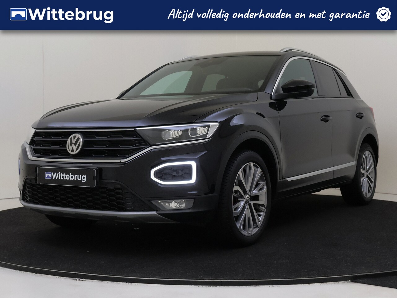 Volkswagen T-Roc - 1.5 TSI 150pk Sport | Navigatie | Sportstoelen | Executive Pakket - AutoWereld.nl