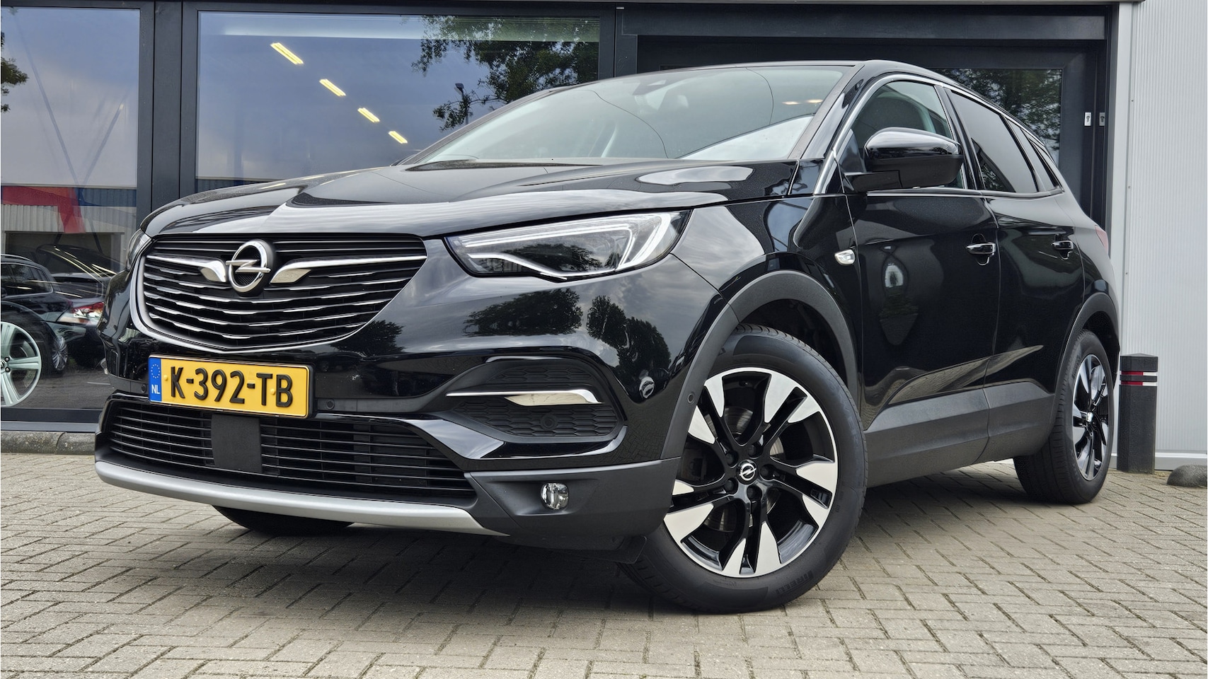 Opel Grandland X - 1.2 Turbo Business Executive + CAMERA + COMFORTSTOELEN + NAVI + LED + LM VELGEN - AutoWereld.nl