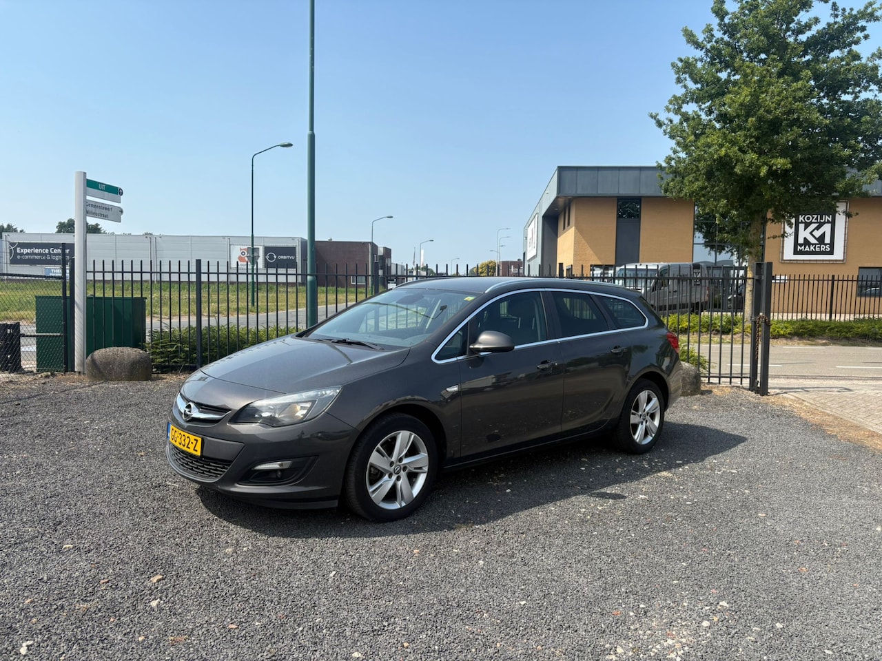 Opel Astra Sports Tourer - 1.6 CDTi Business + / ECC / Cruise-Control / NAVI - AutoWereld.nl