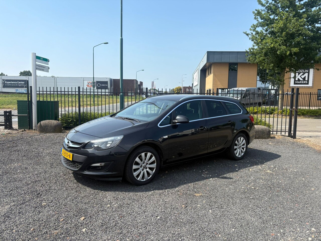 Opel Astra Sports Tourer - 1.6 CDTi Business + / ECC / Cruise-Control / NAVI - AutoWereld.nl