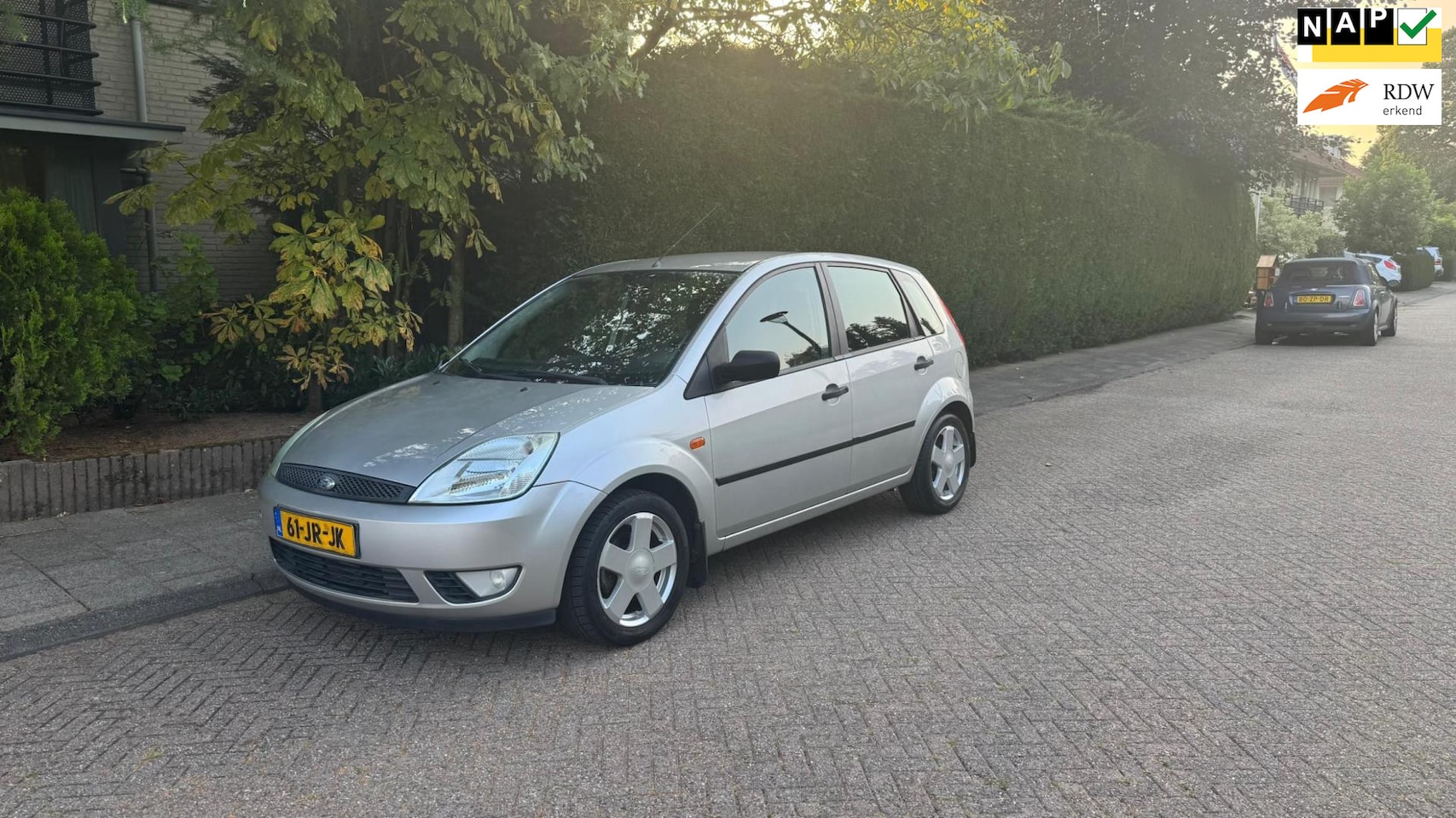 Ford Fiesta - 1.4-16V AIRCO/VELGEN/RIJDT GOED/LAGE KM/NAP/5DRS - AutoWereld.nl