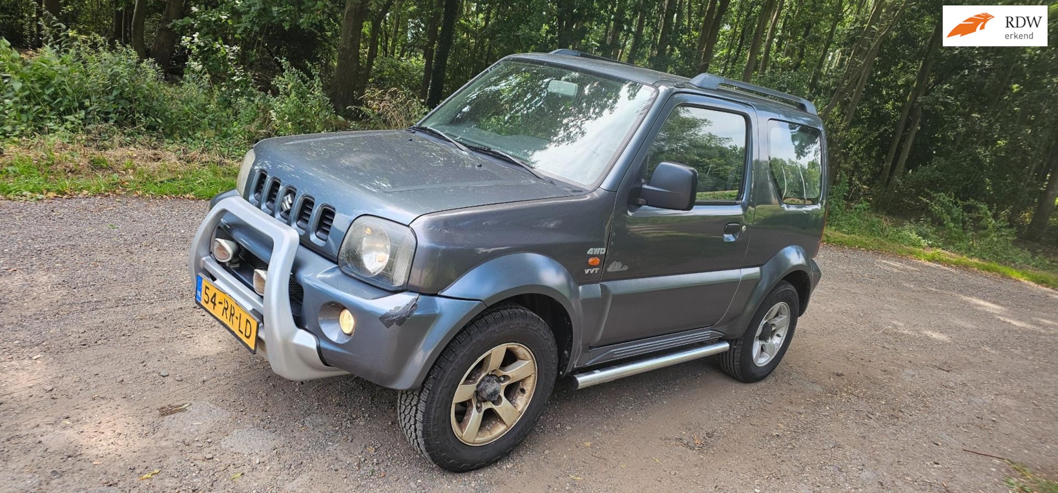 Suzuki Jimny - 1.3 Exclusive airco awd lage kms - AutoWereld.nl