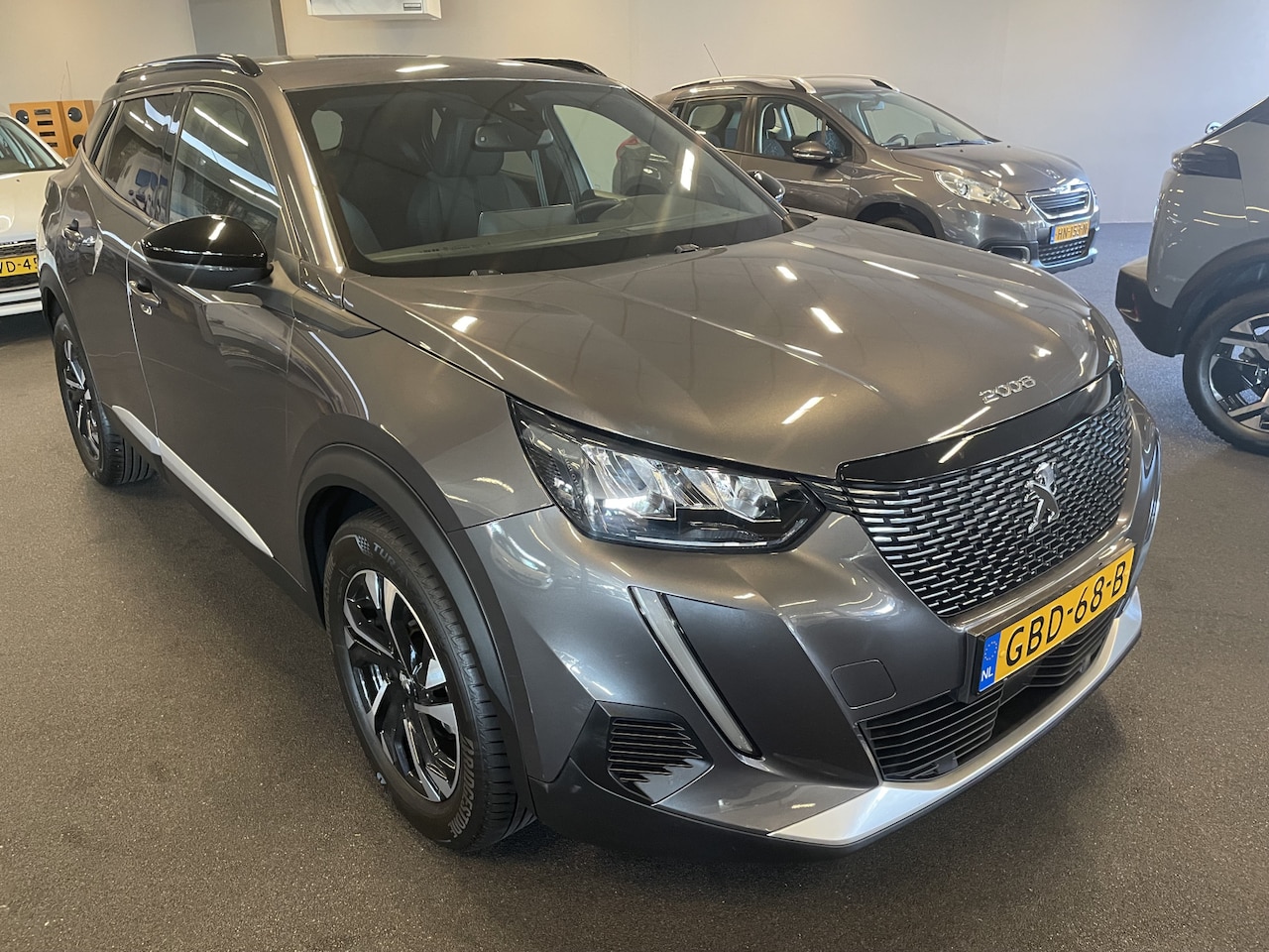 Peugeot 2008 - 1.2 PureTech Allure Pack CLIMATE CONTROL-NAVIGATIE-PARKEERSENSOREN - AutoWereld.nl