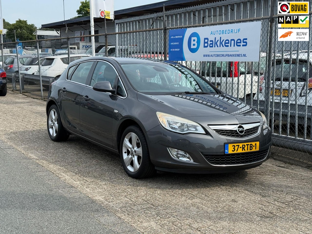 Opel Astra - 1.4 Turbo Edition | Airco | Cruise | Navi - AutoWereld.nl