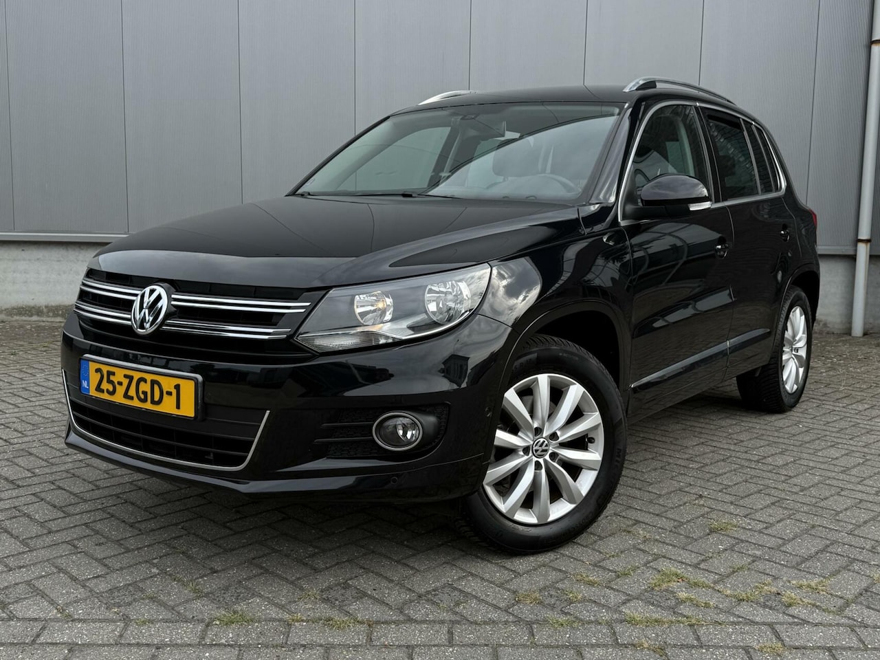 Volkswagen Tiguan - 1.4 TSI Sport&Style R-line Edition - AutoWereld.nl