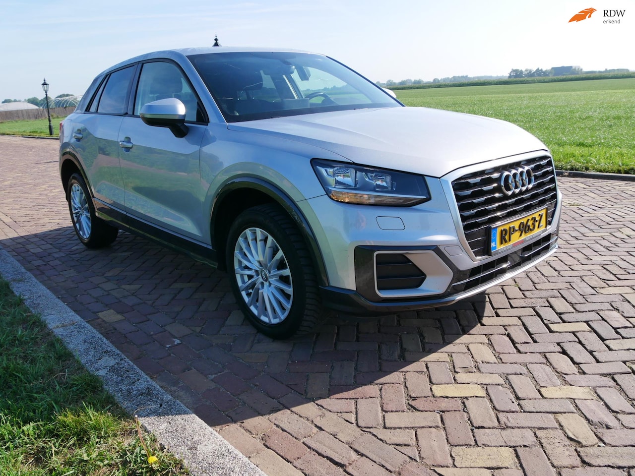 Audi Q2 - 1.6 TDI Design S-Tronic AC ALU NAVI ** 10999 NETTO ** - AutoWereld.nl