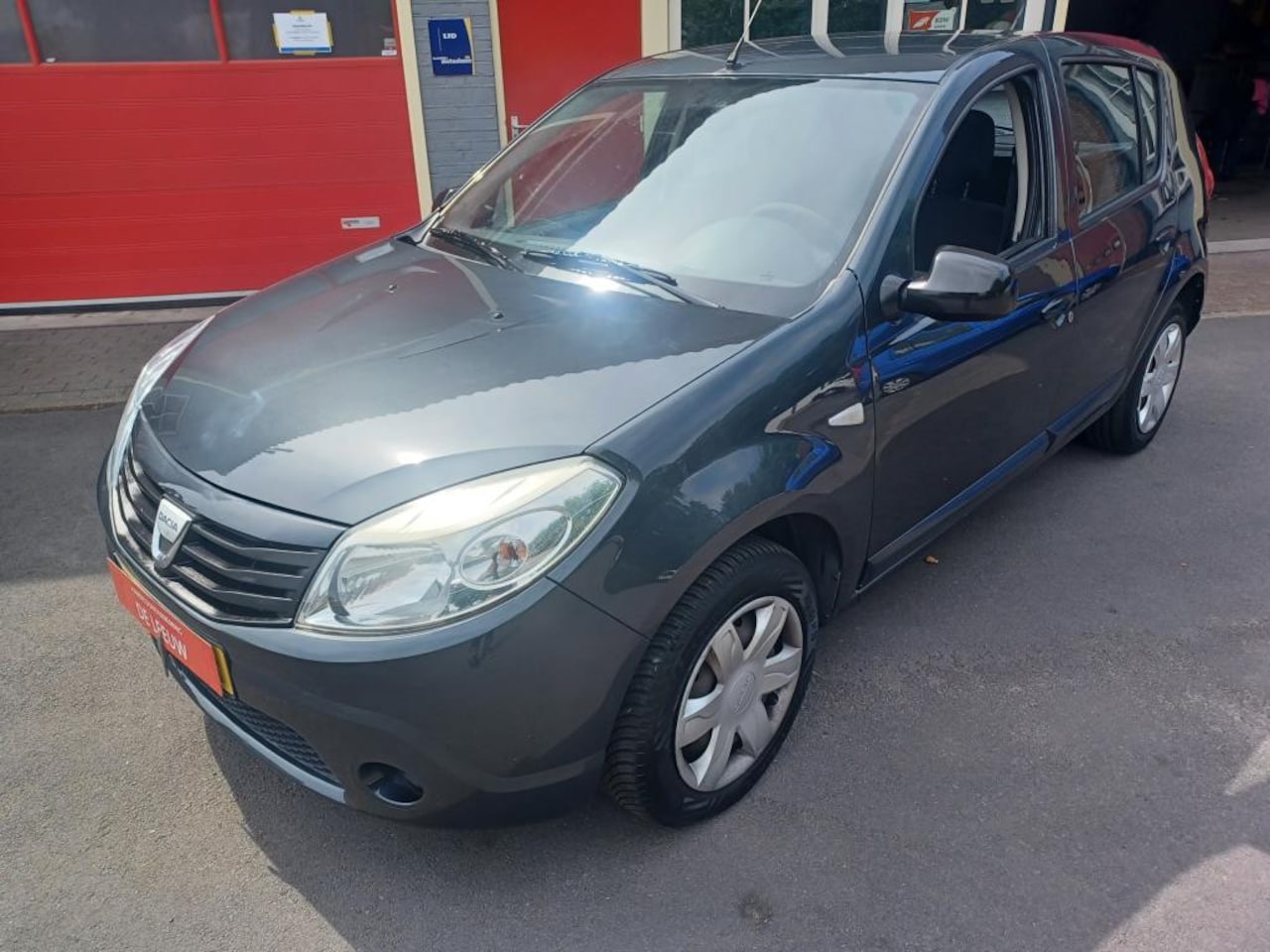 Dacia Sandero - 1.4 Ambiance met nieuwe distributie - AutoWereld.nl