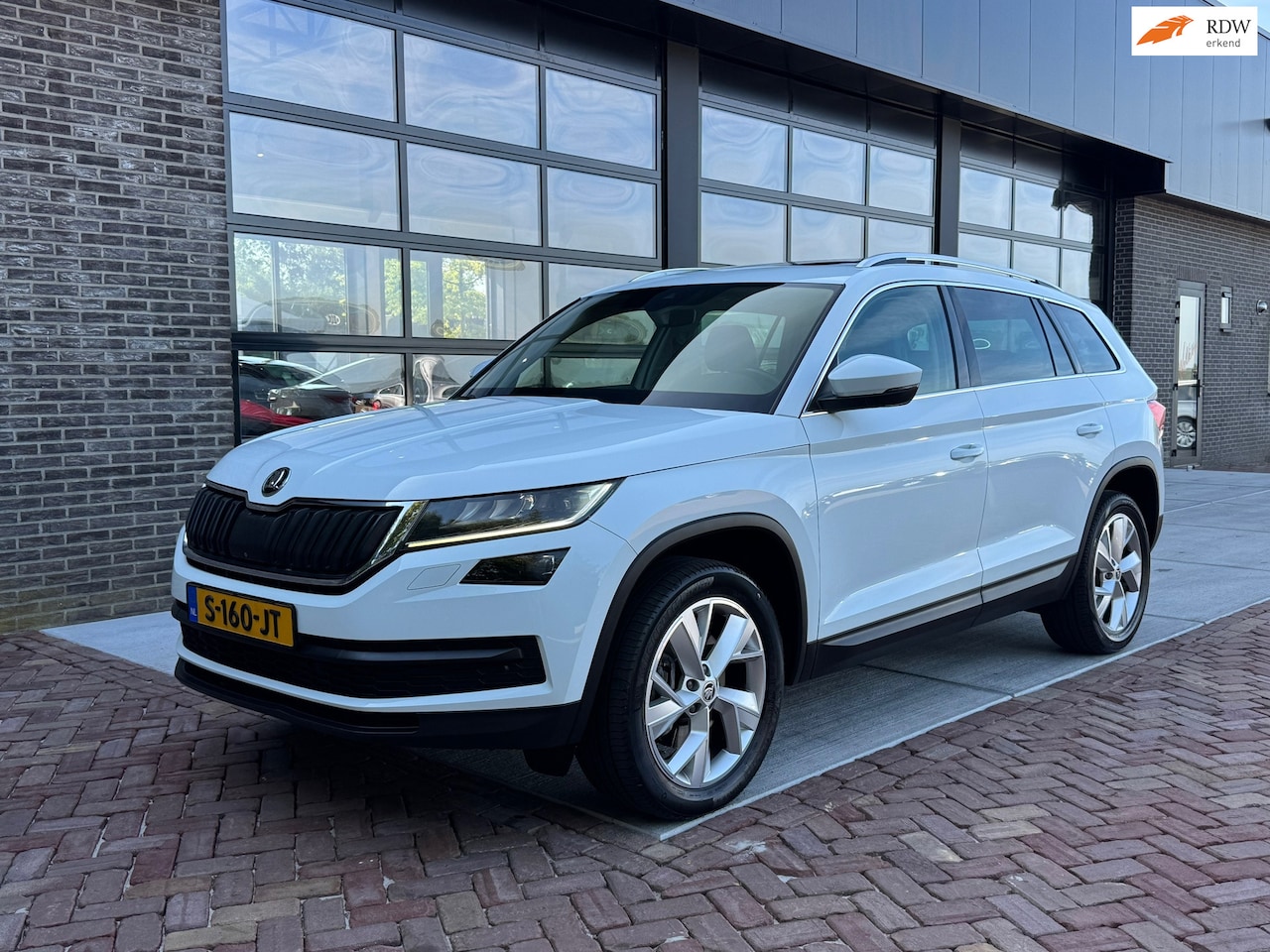 Skoda Kodiaq - 2.0 TSI 4x4 Style Business 7p. | Uniek | Vol | Pano | - AutoWereld.nl